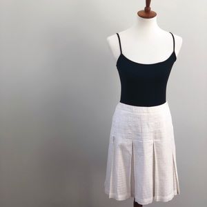calvin klein • white knee length pleated skirt